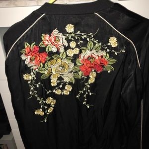 Bomber jacket with floral designs